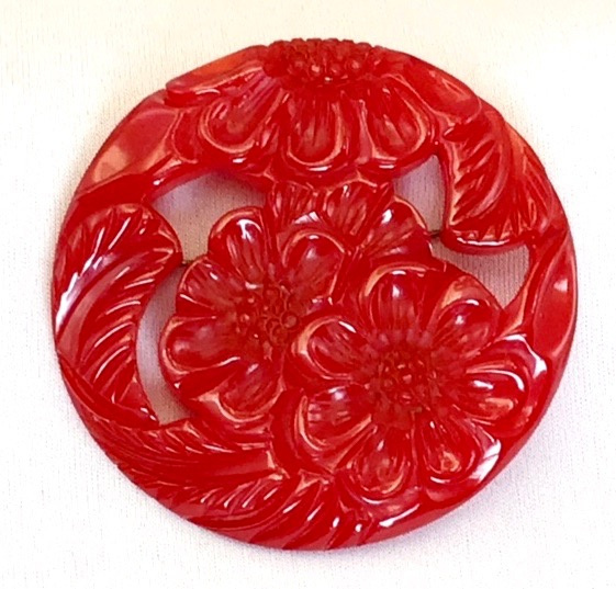 BP123 translucent red carved flower pin